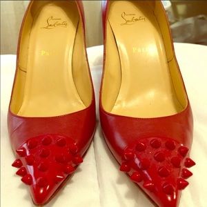 100% authentic Christian Louboutin red spike pumps